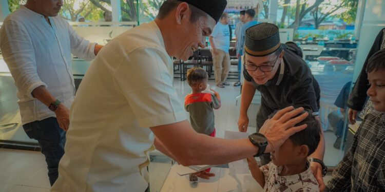 Satreskrim Polres Lhokseumawe Muliakan Puluhan Anak Yatim di Meja Berbuka